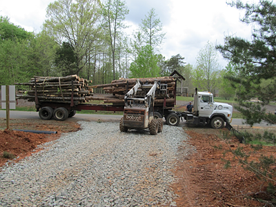 8 – Skid loading logs at curb side to reduce sediment from leaving the site